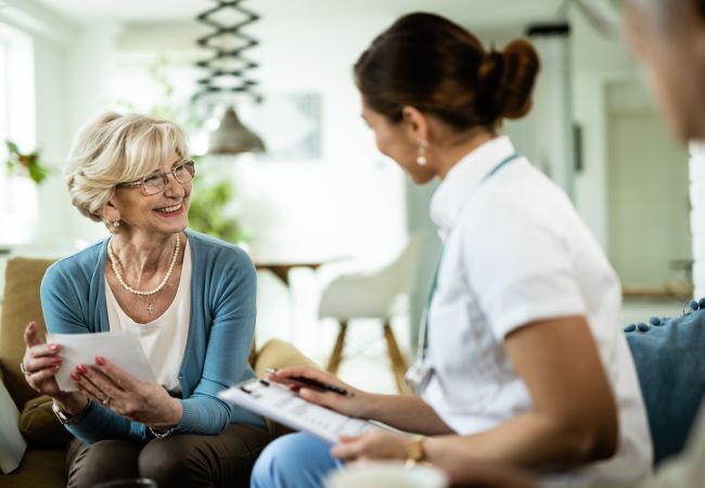 elderly lady with her doctor